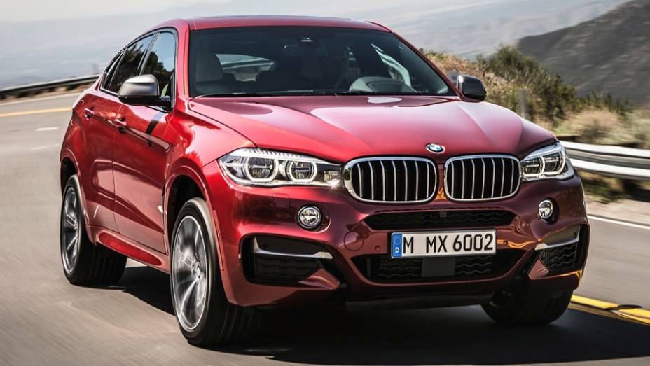 A BMW apresentou oficialmente o modelo 2015 do X6 | <a href="https://beta-develop.quatrorodas.abril.com.br/noticias/fabricantes/bmw-oficializa-x6-2015-785241.shtml" rel="migration">Leia mais</a>