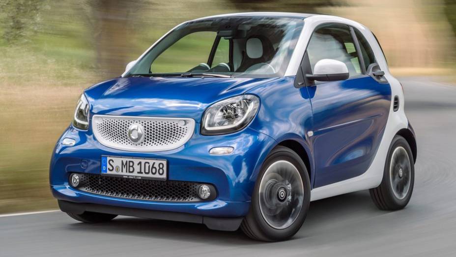 Smart ForTwo | <a href="https://beta-develop.quatrorodas.abril.com.br/noticias/mercado/candidatos-carro-ano-2015-europa-sao-revelados-791548.shtml" rel="migration">Leia mais</a>