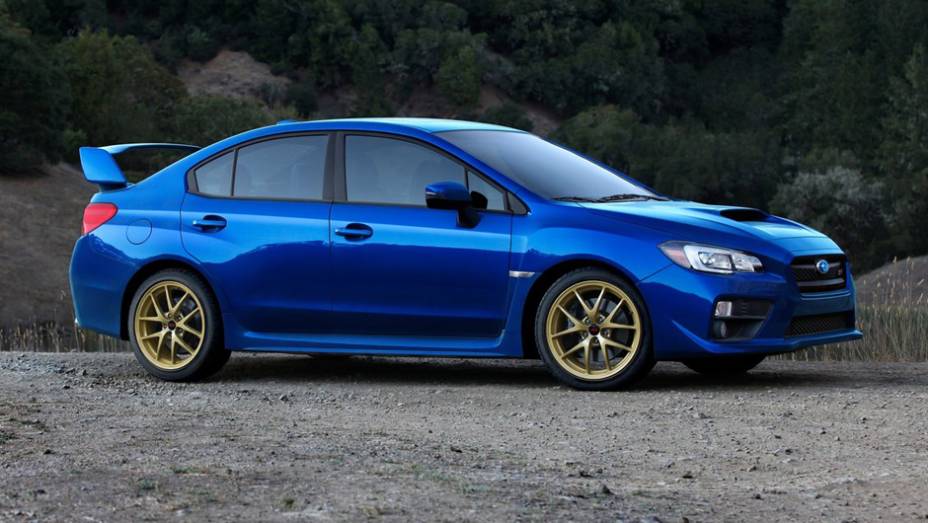 Subaru WRX STI | <a href="https://beta-develop.quatrorodas.abril.com.br/noticias/mercado/candidatos-carro-ano-2015-europa-sao-revelados-791548.shtml" rel="migration">Leia mais</a>