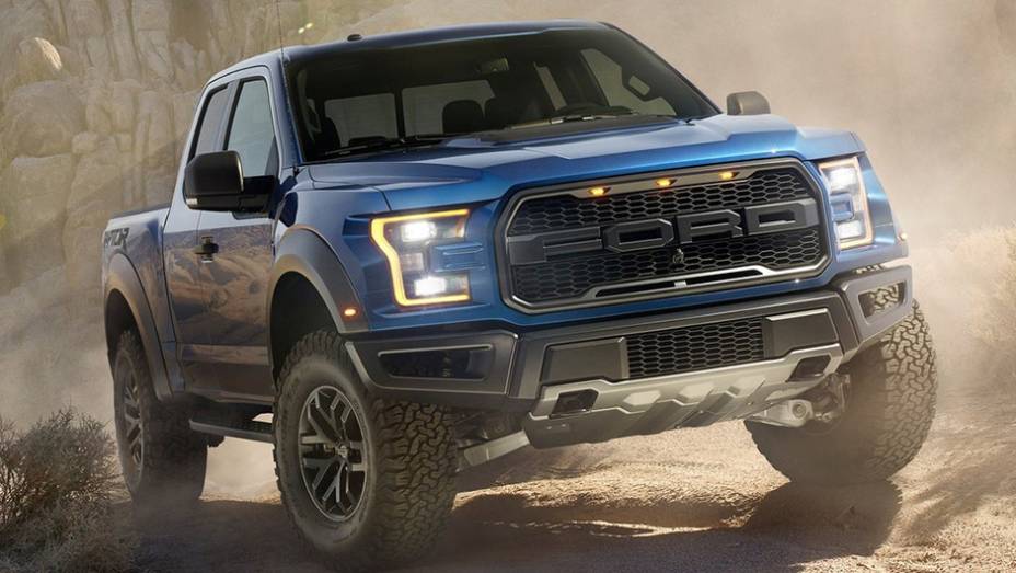 As picapes também têm vez no Salão de Detroit, e, nesta segunda-feira, a Ford mostrou a nova F-150 Raptor | <a href="https://beta-develop.quatrorodas.abril.com.br/noticias/saloes/detroit-2015/ford-revela-picape-f-150-raptor-2017-825040.shtml" rel="migration">Leia mais</a>