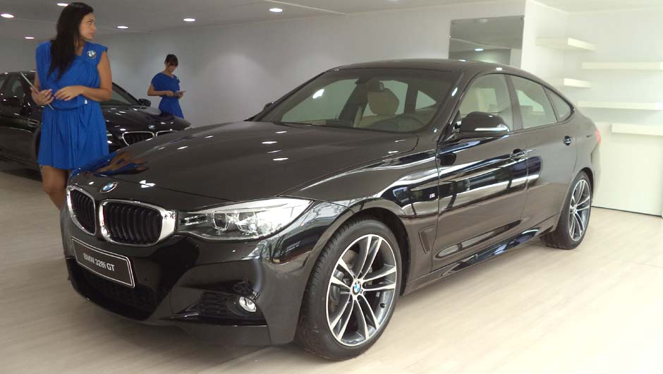 ... e o crossover S&eacute;rie 3 Gran Turismo | <a href="https://beta-develop.quatrorodas.abril.com.br/noticias/fabricantes/auto-premium-show-abre-portas-sp-760626.shtml" rel="migration">Leia mais</a>