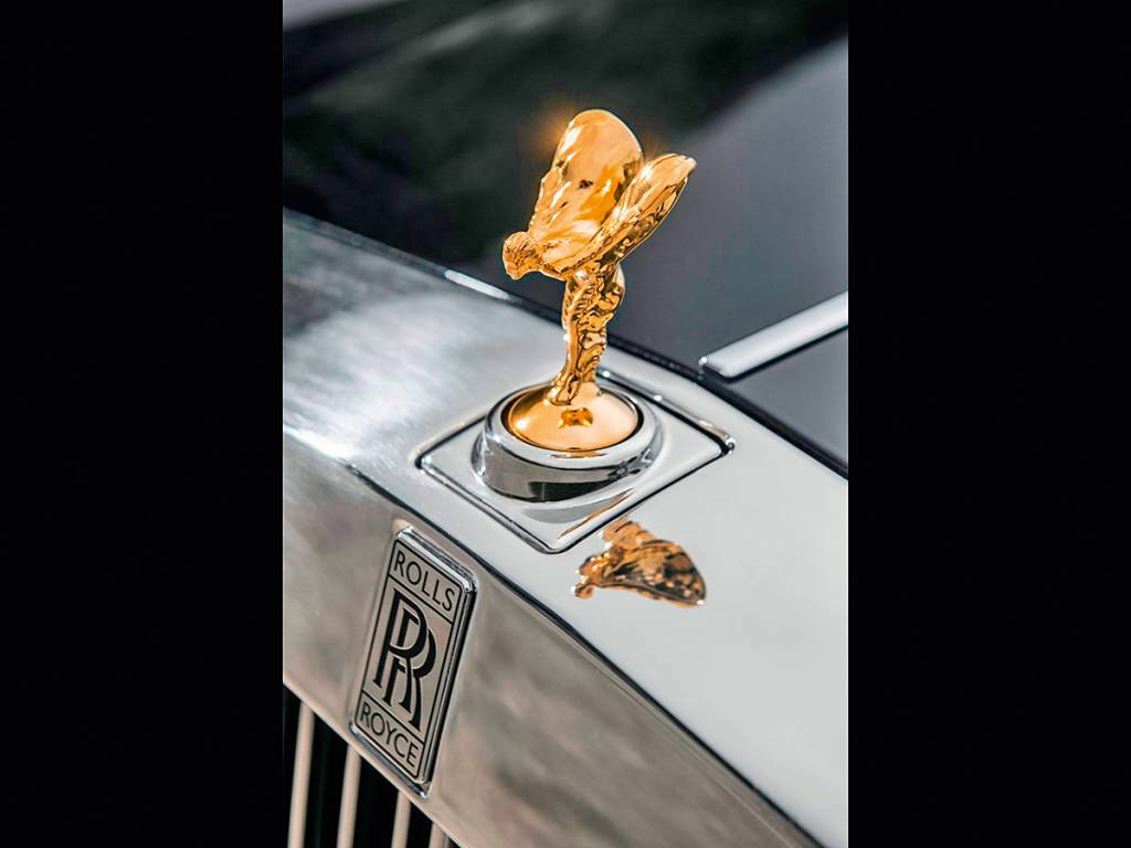 Spirit of Ecstasy banhada a ouro Spirit of Ecstasy banhada a ouro