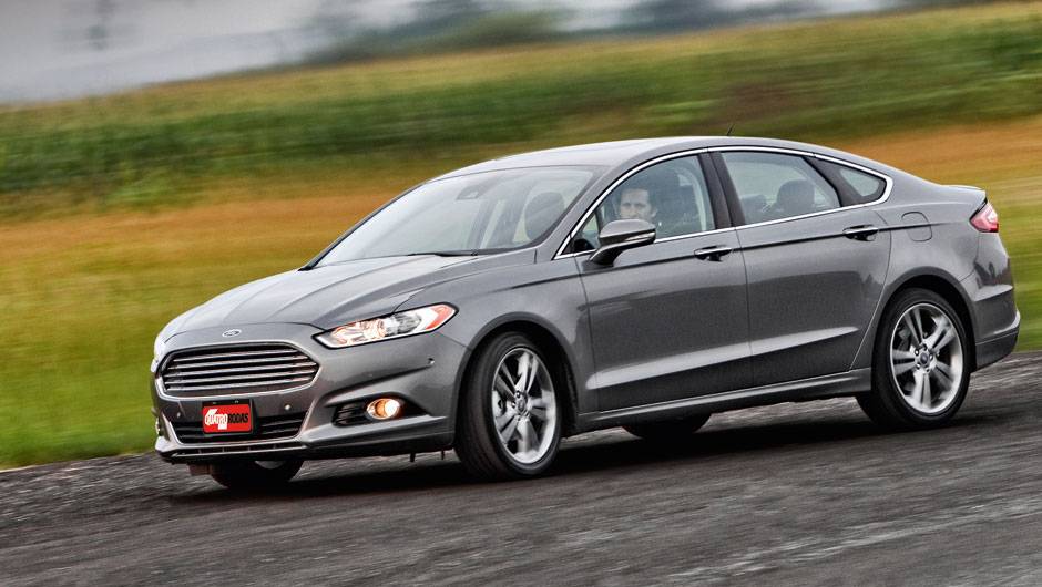 Grade trapezoidal inspirada nos Aston Martin | <a href="https://beta-develop.quatrorodas.abril.com.br/carros/impressoes/ford-fusion-2-0-titanium-716588.shtml" rel="migration">Leia mais</a> Grade trapezoidal inspirada nos Aston Martin | <a href="https://beta-develop.quatrorodas.abril.com.br/carros/impressoes/ford-fusion-2-0-titanium-716588.shtml" rel="migration">Leia mais</a>