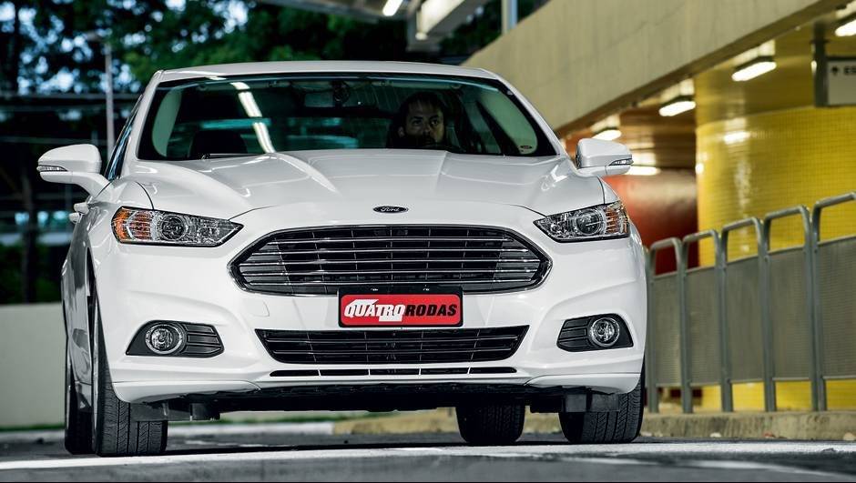 A grade dianteira foi inspirada nos esportivos ingleses da Aston Martin | <a href="https://beta-develop.quatrorodas.abril.com.br/carros/testes/ford-fusion-2-5-flex-736957.shtml" rel="migration">Leia mais</a> A grade dianteira foi inspirada nos esportivos ingleses da Aston Martin | <a href="https://beta-develop.quatrorodas.abril.com.br/carros/testes/ford-fusion-2-5-flex-736957.shtml" rel="migration">Leia mais</a>