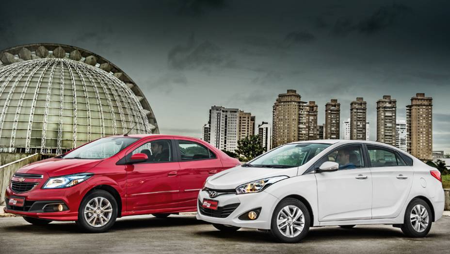 Prisma e HB20S: frente a frente no show de calouros | <a href="https://beta-develop.quatrorodas.abril.com.br/carros/comparativos/chevrolet-prisma-ltz-x-hyundai-hb20s-premium-740129.shtml" rel="migration">Leia mais</a> Prisma e HB20S: frente a frente no show de calouros | <a href="https://beta-develop.quatrorodas.abril.com.br/carros/comparativos/chevrolet-prisma-ltz-x-hyundai-hb20s-premium-740129.shtml" rel="migration">Leia mais</a>
