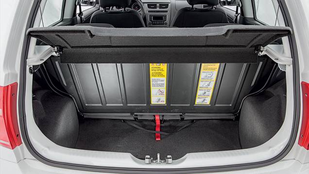 No porta-malas cabem 260 litros de bagagem | <a href="https://beta-develop.quatrorodas.abril.com.br/carros/testes/volkswagen-fox-bluemotion-749109.shtml" rel="migration">Leia mais</a> No porta-malas cabem 260 litros de bagagem | <a href="https://beta-develop.quatrorodas.abril.com.br/carros/testes/volkswagen-fox-bluemotion-749109.shtml" rel="migration">Leia mais</a>