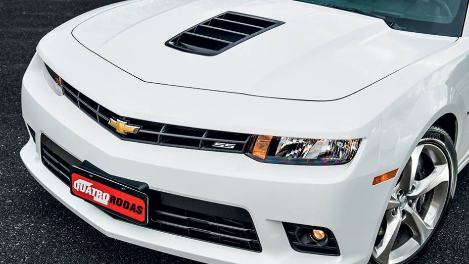 A abertura no capô ajuda na refrigeração do motor e reforça o visual esportivo | <a href="https://beta-develop.quatrorodas.abril.com.br/carros/testes/chevrolet-camaro-ss-763989.shtml" rel="migration">Leia mais</a> A abertura no capô ajuda na refrigeração do motor e reforça o visual esportivo | <a href="https://beta-develop.quatrorodas.abril.com.br/carros/testes/chevrolet-camaro-ss-763989.shtml" rel="migration">Leia mais</a>