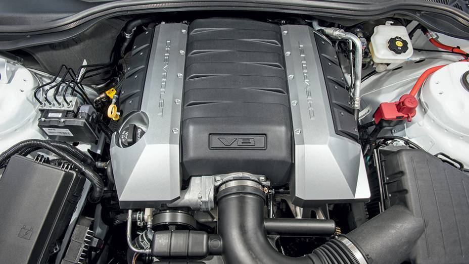 O V8 gera 406 cv de potência | <a href="https://beta-develop.quatrorodas.abril.com.br/carros/testes/chevrolet-camaro-ss-763989.shtml" rel="migration">Leia mais</a> O V8 gera 406 cv de potência | <a href="https://beta-develop.quatrorodas.abril.com.br/carros/testes/chevrolet-camaro-ss-763989.shtml" rel="migration">Leia mais</a>