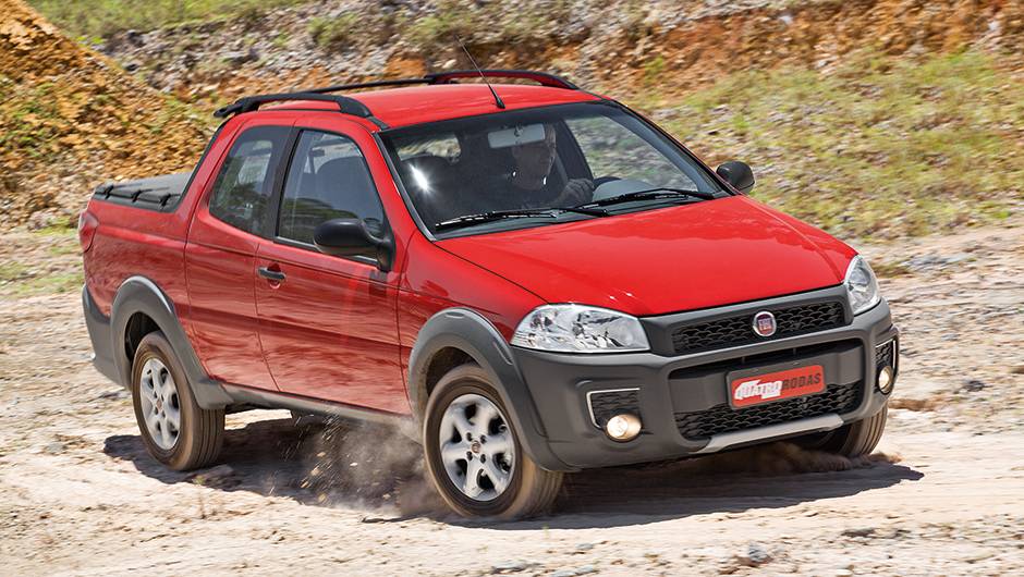 Para-choque dianteiro lembra o do Uno | <a href="https://beta-develop.quatrorodas.abril.com.br/carros/impressoes/fiat-strada-working-1-4-764158.shtml" rel="migration">Leia mais</a> Para-choque dianteiro lembra o do Uno | <a href="https://beta-develop.quatrorodas.abril.com.br/carros/impressoes/fiat-strada-working-1-4-764158.shtml" rel="migration">Leia mais</a>