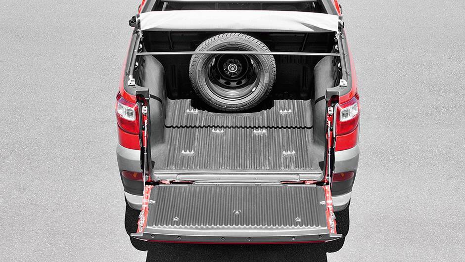 Caçamba curta: 680 litros ou 650 kg | <a href="https://beta-develop.quatrorodas.abril.com.br/carros/impressoes/fiat-strada-working-1-4-764158.shtml" rel="migration">Leia mais</a> Caçamba curta: 680 litros ou 650 kg | <a href="https://beta-develop.quatrorodas.abril.com.br/carros/impressoes/fiat-strada-working-1-4-764158.shtml" rel="migration">Leia mais</a>