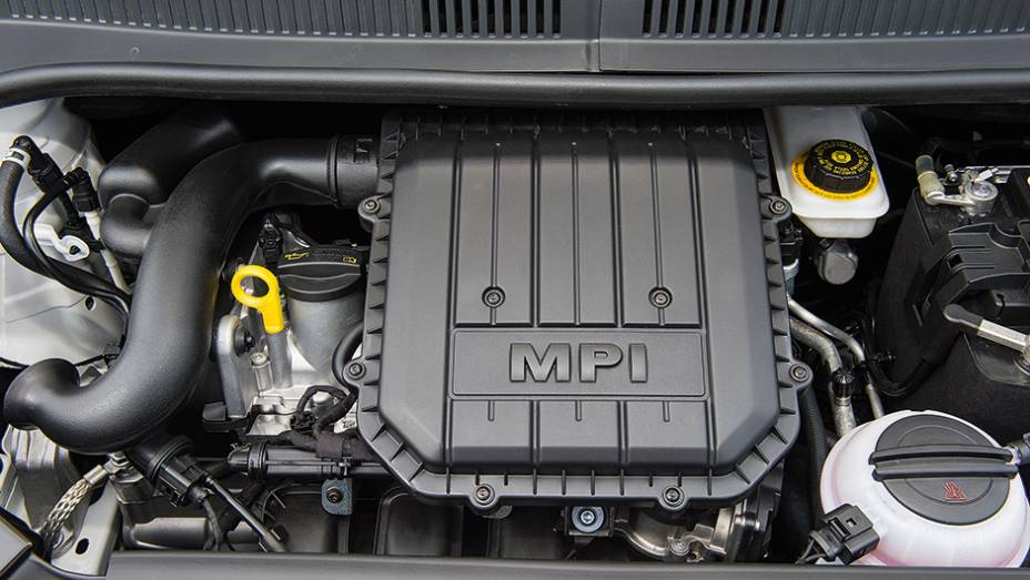 Motor 1.0 flex, de 82 cv, conta com sistema de partida a frio (sem tanquinho) | <a href="https://beta-develop.quatrorodas.abril.com.br/carros/testes/volkswagen-up-773936.shtml" rel="migration">Leia mais</a>