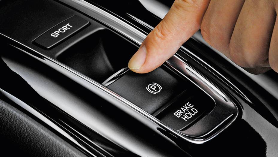Vers&atilde;o h&iacute;brida tem alavanca de c&acirc;mbio minimalista, com modo Park por tecla | <a href="https://beta-develop.quatrorodas.abril.com.br/carros/impressoes/honda-vezel-777550.shtml" rel="migration">Leia mais</a>