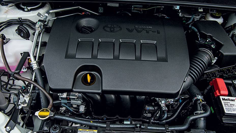Motor 1.8 abandonou o tanquinho de partida a frio | <a href="https://beta-develop.quatrorodas.abril.com.br/carros/testes/toyota-corolla-gli-1-8-783149.shtml" rel="migration">Leia mais</a>