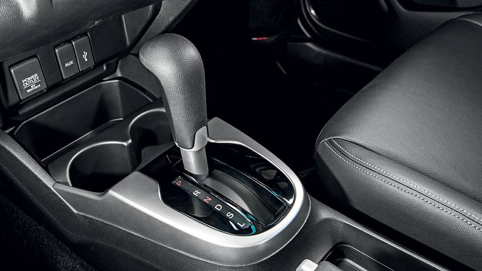Câmbio é CVT, sem trocas manuais | <a href="https://beta-develop.quatrorodas.abril.com.br/carros/testes/honda-fit-exl-1-5-786780.shtml" rel="migration">Leia mais</a> Câmbio é CVT, sem trocas manuais | <a href="https://beta-develop.quatrorodas.abril.com.br/carros/testes/honda-fit-exl-1-5-786780.shtml" rel="migration">Leia mais</a>