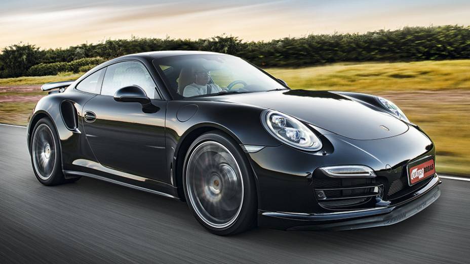 Com rodas aro 20 e bitolas maiores, o 911 ficou mais bem-assentado | <a href="https://beta-develop.quatrorodas.abril.com.br/carros/testes/porscshe-911-turbo-795081.shtml" rel="migration">Leia mais</a>