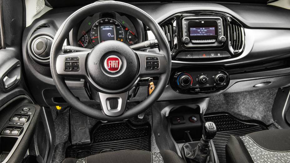 O painel foi inteiramente redesenhado. Volante tem fei&ccedil;&otilde;es da linha-irm&atilde; Jeep | <a href="https://beta-develop.quatrorodas.abril.com.br/carros/impressoes/fiat-uno-evolution-1-4-802577.shtml" target="_blank" rel="migration">Leia mais</a>