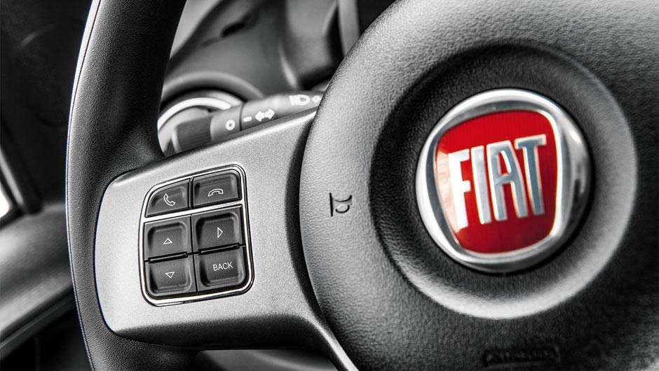 Volante com comandos de som e do computador de bordo | <a href="https://beta-develop.quatrorodas.abril.com.br/carros/impressoes/fiat-uno-evolution-1-4-802577.shtml" target="_blank" rel="migration">Leia mais</a> Volante com comandos de som e do computador de bordo | <a href="https://beta-develop.quatrorodas.abril.com.br/carros/impressoes/fiat-uno-evolution-1-4-802577.shtml" target="_blank" rel="migration">Leia mais</a>