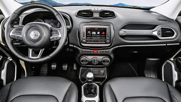 Volante multifuncional cheio de botões e apoio de mão para encarar o off-road | <a href="https://beta-develop.quatrorodas.abril.com.br/carros/impressoes/jeep-renegade-808905.shtml" target="_blank" rel="migration">Leia mais</a> Volante multifuncional cheio de botões e apoio de mão para encarar o off-road | <a href="https://beta-develop.quatrorodas.abril.com.br/carros/impressoes/jeep-renegade-808905.shtml" target="_blank" rel="migration">Leia mais</a>