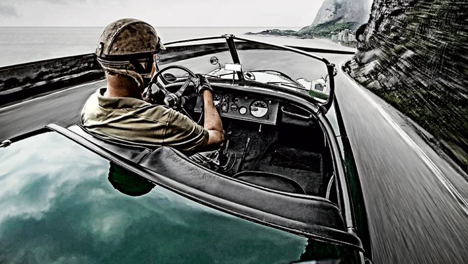 Com a pedra da Gávea ao fundo, o Jaguar XK120 roda pela Av. Niemeyer... | <a href="https://beta-develop.quatrorodas.abril.com.br/reportagens/geral/volta-origens-841803.shtml" target="_blank" rel="migration">Leia mais</a> Com a pedra da Gávea ao fundo, o Jaguar XK120 roda pela Av. Niemeyer... | <a href="https://beta-develop.quatrorodas.abril.com.br/reportagens/geral/volta-origens-841803.shtml" target="_blank" rel="migration">Leia mais</a>