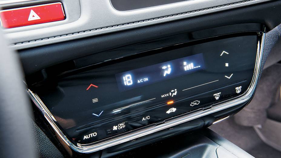 Ar-condicionado digital | <a href="https://beta-develop.quatrorodas.abril.com.br/carros/testes/honda-hr-v-exl-848201.shtml" target="_blank" rel="migration">Leia mais</a> Ar-condicionado digital | <a href="https://beta-develop.quatrorodas.abril.com.br/carros/testes/honda-hr-v-exl-848201.shtml" target="_blank" rel="migration">Leia mais</a>