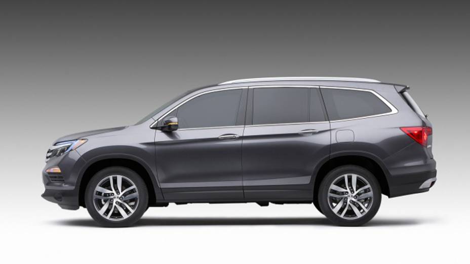 O SUV foi renovado em sintonia com a identidade visual da Honda | <a href="https://beta-develop.quatrorodas.abril.com.br/noticias/fabricantes/honda-divulga-imagens-pilot-2016-835540.shtml" rel="migration">Leia mais</a>