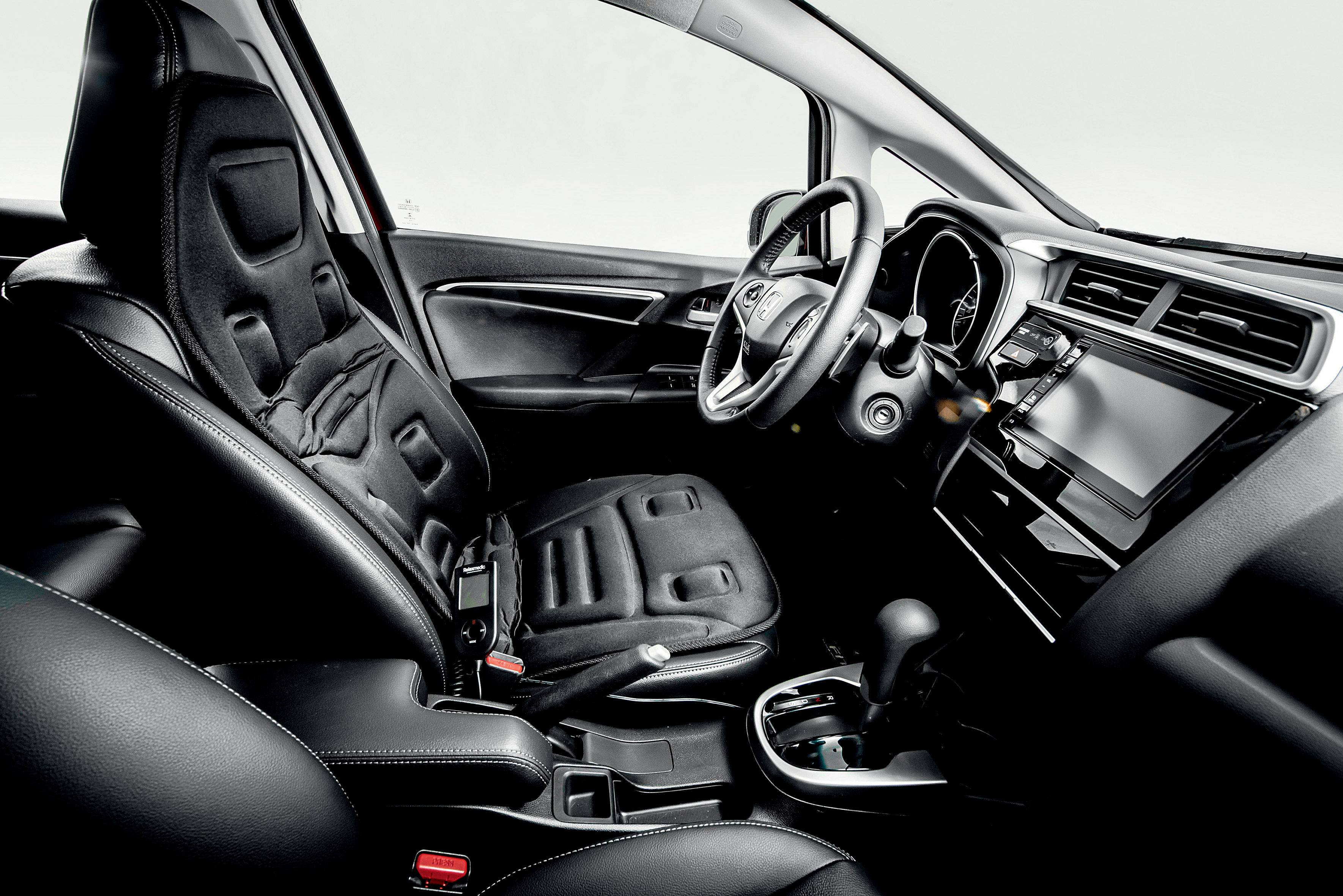 Este massageador reduz mesmo o cansaço de ficar horas sentado no carro?