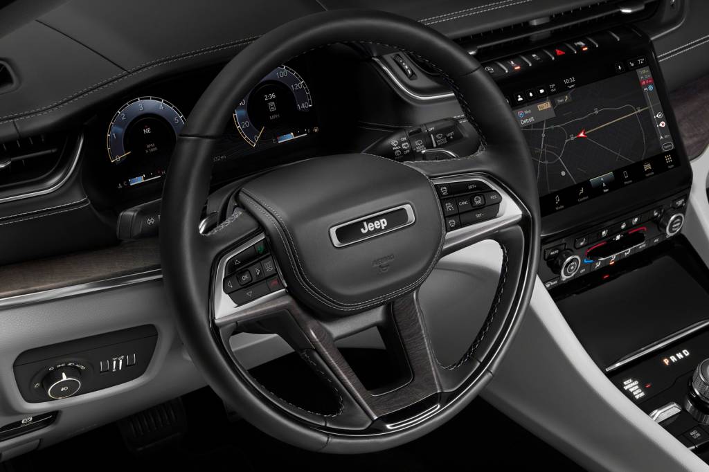 The all-new 2021 Jeep® Grand Cherokee L Overland leather-wrappe The all-new 2021 Jeep® Grand Cherokee L Overland leather-wrapped multifunction steering wheel complements the new finely crafted leather-wrapped, stitched instrument panel.