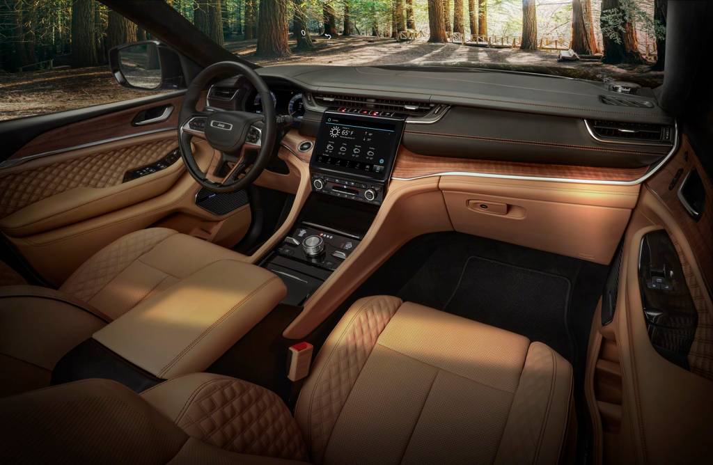 The all-new 2021 Jeep® Grand Cherokee L Summit Reserve model’ The all-new 2021 Jeep® Grand Cherokee L Summit Reserve model’s spacious interior features standard 10-inch display screens, including a frameless digital gauge cluster and 10.1-inch Uconnect 5 touchscreen radio, hand-wrapped, quilted Palermo leather and open-pore Waxed Walnut wood accents, all-new LED lighting with ambient features, driver and front passenger seat massage and personalized climate zones.