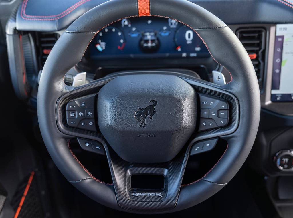 2022 Bronco Raptor Interior – Rhapsody Blue Botões inferiores controlam ajuste de suspensão e funções