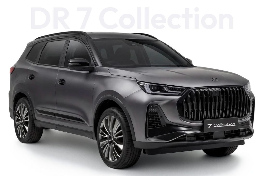 SUV DR 7 Collection cinza escuro met&aacute;lico, com grade frontal preta vertical e rodas esportivas, visto de frente e lateralmente sobre fundo branco
